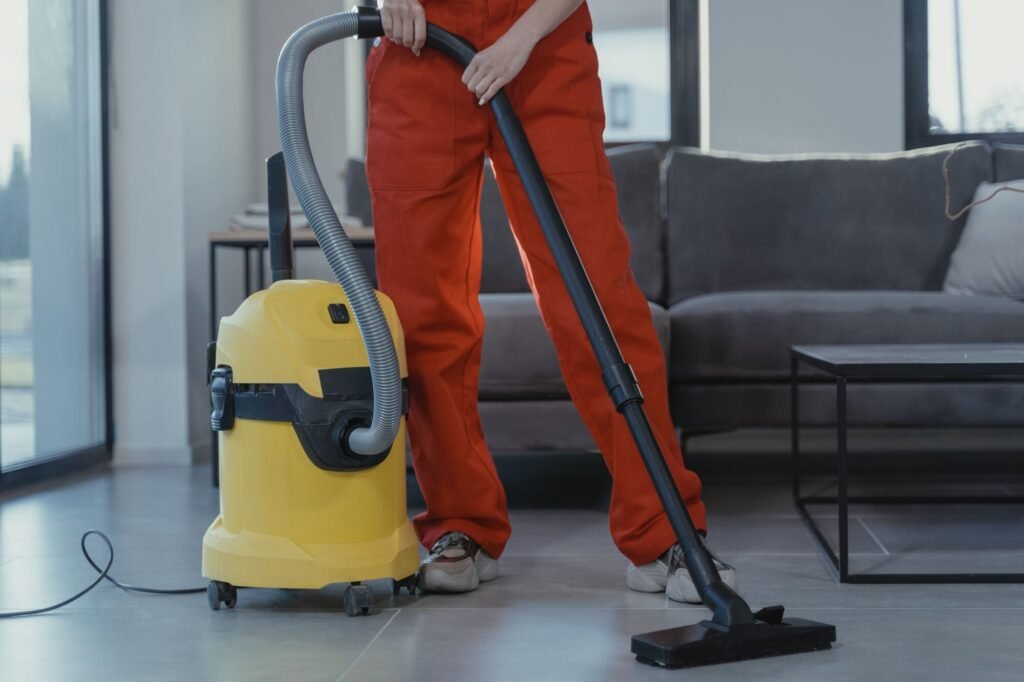 professional cleaner vacuuming